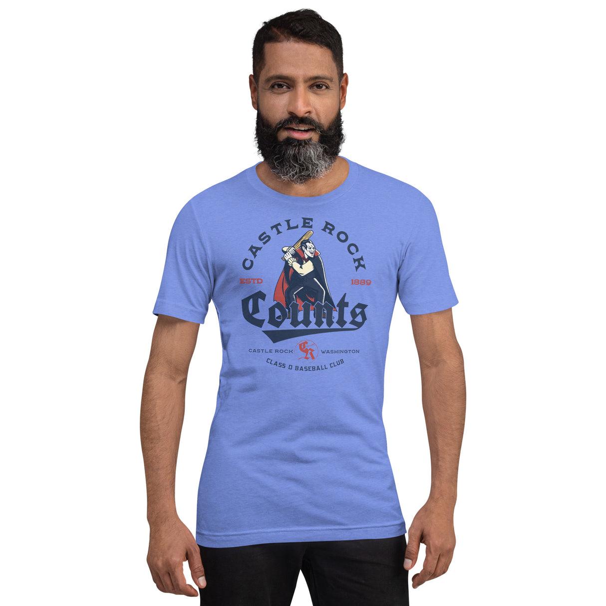 Male model wearing Castle Rock Counts old school baseball shirt in Heather Royal Blue, inspired by vintage minor league team branding.