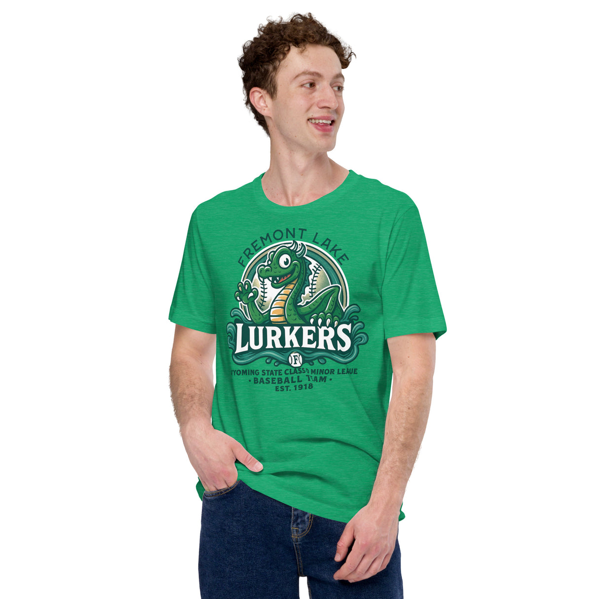 Male model wearing the Fremont Lake Lurkers t-shirt in heather kelly green, featuring a cryptid baseball mascot inspired by Nessie.