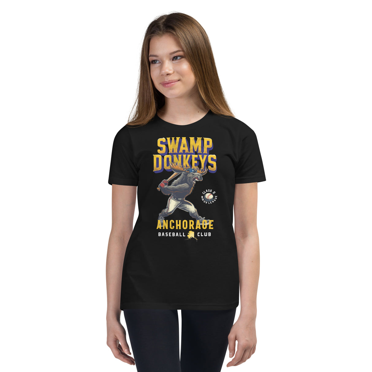Girl in Swamp Donkeys youth tee ā retro mascot style