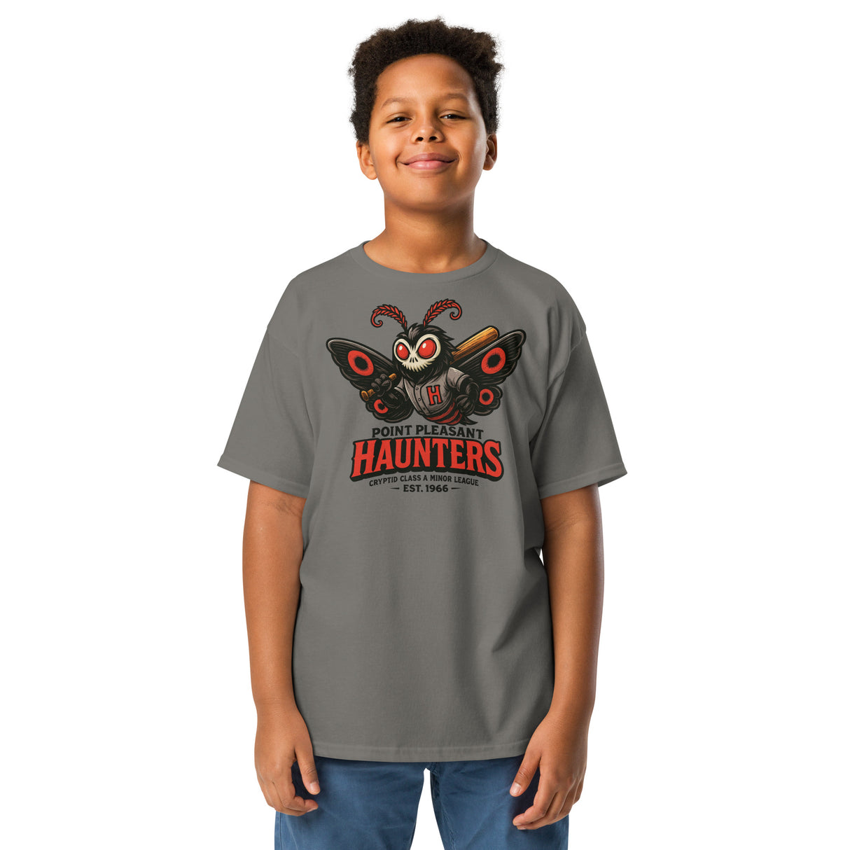 Young boy wearing charcoal Point Pleasant Haunters Mothman tee, part of the Outfield Outlaws Cryptid Mascot Series