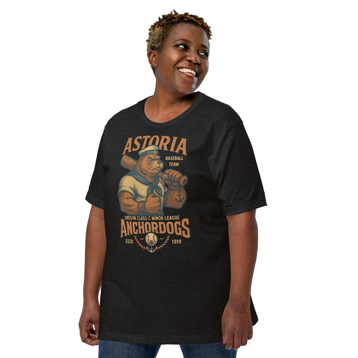 Female model wearing Astoria Anchordogs retro baseball tee in heather black with Outfield Outlaws mascot graphic