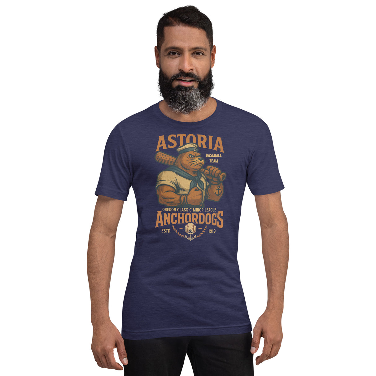 Male model wearing navy Astoria Anchordogs shirt with cartoon sailor sea lion mascot holding bat