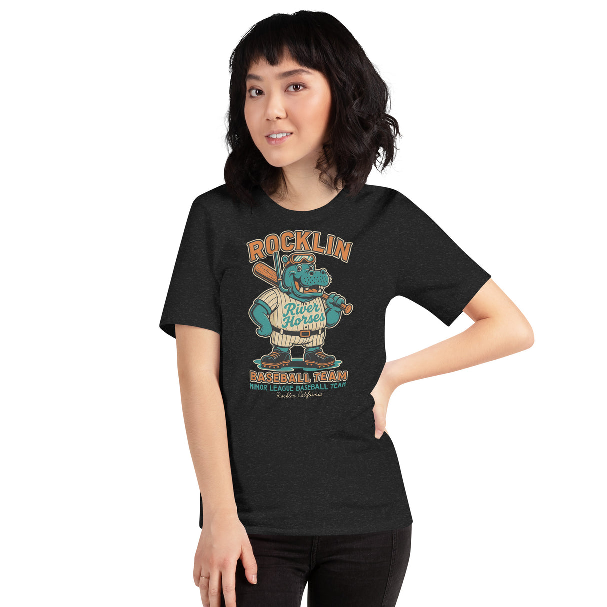 Adult female model wearing Rocklin River Horses retro baseball tee in heather black featuring cartoon hippo mascot