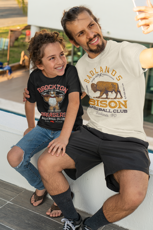 father and son wearing funny retro baseball shirts taking a selfie