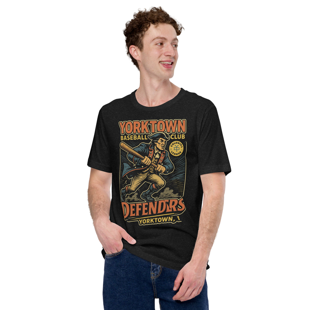 Male model wearing Yorktown Defenders baseball t-shirt in black with retro patriot mascot design