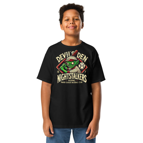 Young boy wearing black Devil’s Den Nightstalkers retro baseball shirt with vintage goblin mascot from Outfield Outlaws