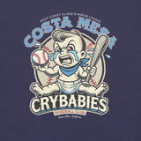 Close-up view of the Costa Mesa Crybabies mascot design on a heather navy tee, showing the detailed vintage cartoon baby holding a baseball bat.