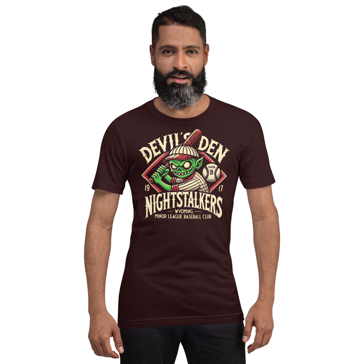 Man wearing Devil’s Den Nightstalkers t-shirt in oxblood black, showcasing the goblin baseball mascot in bold vintage style.
