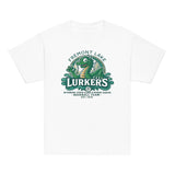Top-down view of Fremont Lake Lurkers youth t-shirts in white, showcasing the vintage cryptid baseball mascot inspired by the Loch Ness Monster.