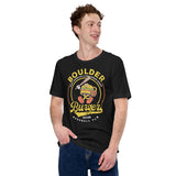 Man wearing black Outfield Outlaws Boulder Burgers tee with vintage baseball mascot