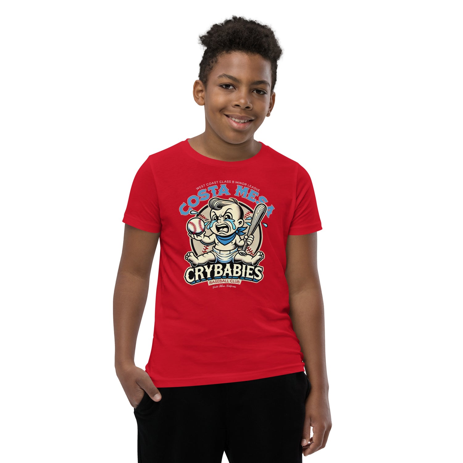 Young boy wearing heather red Costa Mesa Crybabies youth tee showing front and back design with retro mascot
