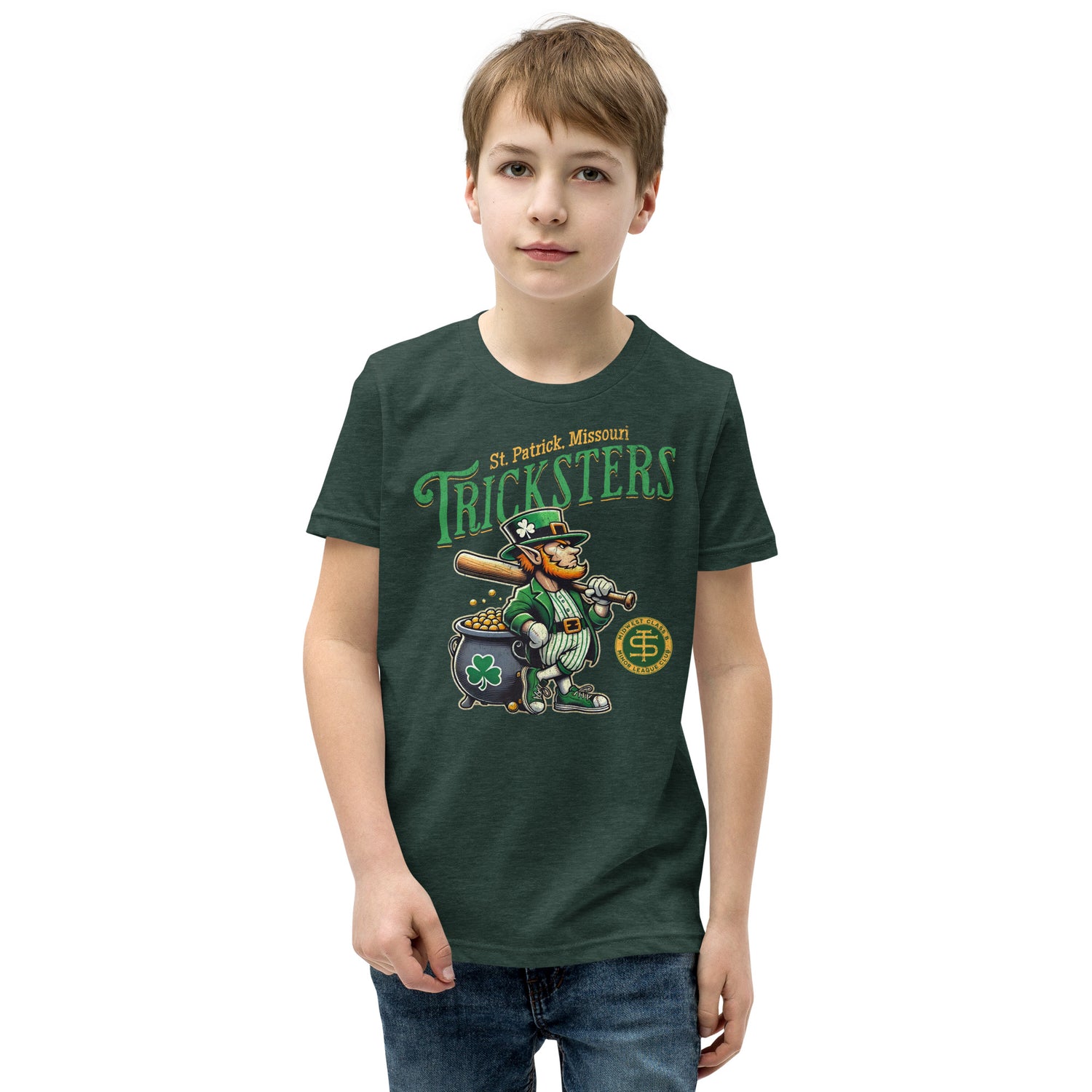 Young boy modeling the Outfield Outlaws St. Patrick Tricksters youth t-shirt in Heather Forest Green, featuring vintage leprechaun mascot graphic.