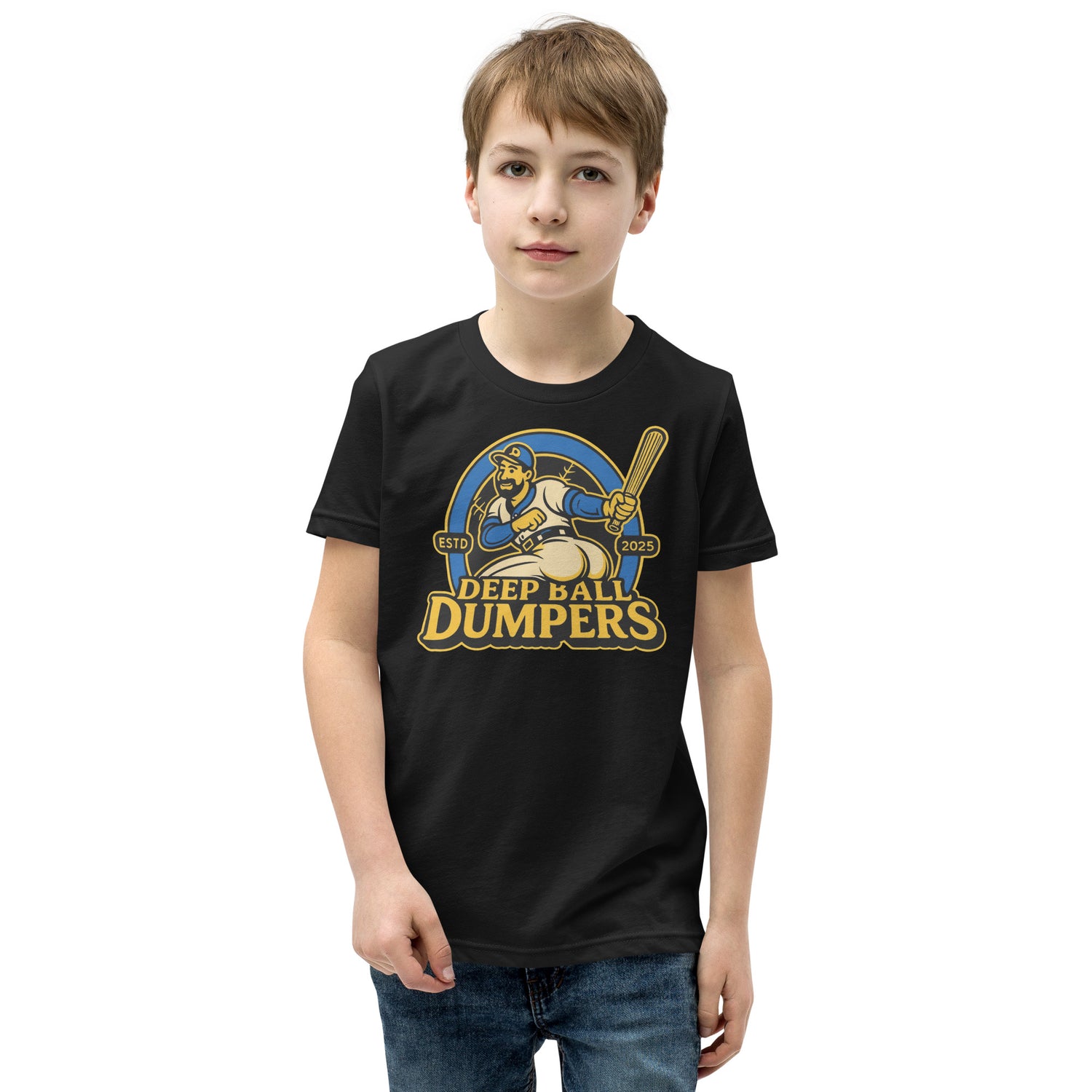 Smiling boy wearing heather black Deep Ball Dumpers tee featuring retro baseball mascot graphic on front.