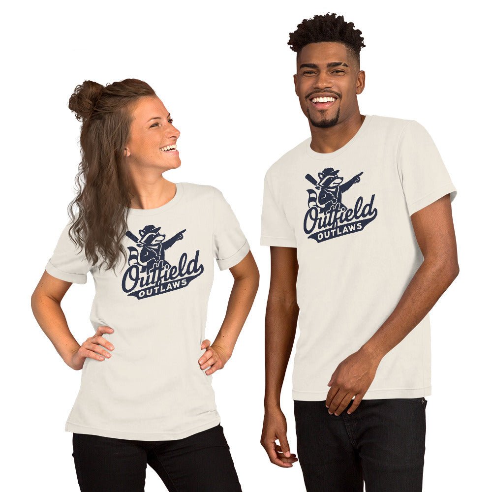Male and female models wearing Outfield Outlaws logo t-shirts in vintage white, featuring small chest print on Bella Canvas shirts